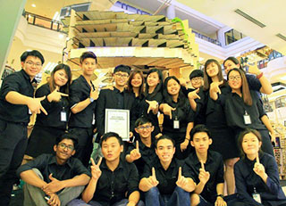 The 17 students including Chan Ching Wei (second row fourth from left) who created the award-winning #17.