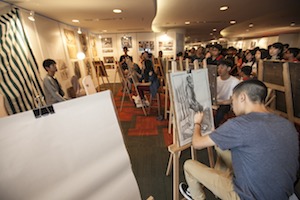 An art demonstration held at the exhibition booth during Malaysia Top 10 Outstanding Young Artists Awards.