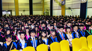 The large gathering of business and humanities graduates.