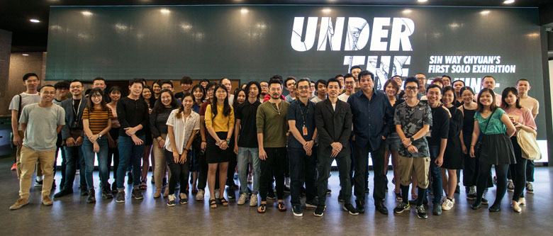 A group shot of the attendees at the opening of the “Under the Skin’ exhibition