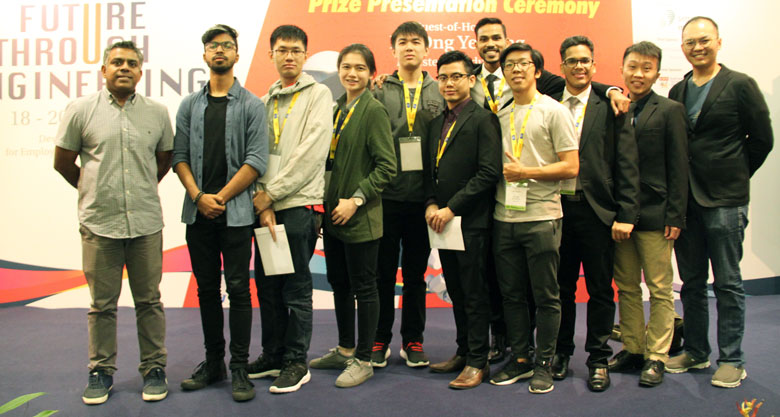 Members of the winning teams from the Asia Pacific University of Technology & Innovation (APU) with their mentors and the Deputy Vice Chancellor cum Chief Innovation Officer of APU, Prof. Dr. Ir. Vinesh Thiruchelvam (first from left) on the stage of the Engineering Innovation Challenge (EIC) 2019, Singapore.