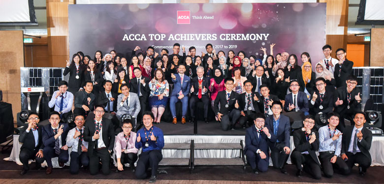Malaysian ACCA Global Prizewinners posing for a group photo during the ACCA Top Achievers Ceremony held on 17 July in the company of ACCA Global President Robert Stenhouse