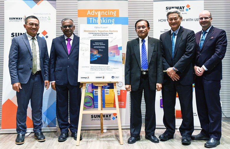 Datuk Mohd Nizom Sairi, SM Thanneermalai, Professor Mohamed Ariff, Professor Yeah Kim Leng and Professor Peter Heard officiating the launch of ‘Malaysia’s Taxation System: Contemporary Practices, Issues and Future Direction’