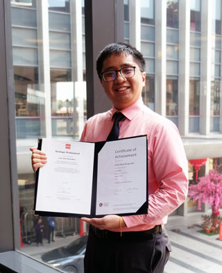 Leon Khoo with his certificate of achievement for scoring top marks in the CIMA SCS paper.