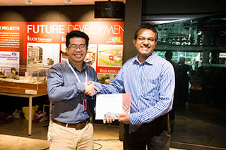 Dr Suresh awarding a certificate