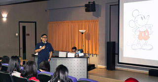 Leonil Saison, Senior Manager of Creative and Product Development Lead at the Walt Disney Company presenting his talk.