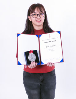 Chow Zen Lu posing with her medal and award for her project in the ASPaC 2018