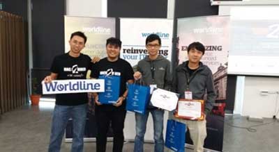 Lee Kang Wenn (2nd from left), Ong Zhe Zhun (3rd from left) and Bornluck Chong Tianler (extreme right), 2nd Runner-Up winners of the Worldline Challenge posing with Mr Chong Chee Wei (extreme left), Solution Consultant from Worldline, one of the sponsors for the event.